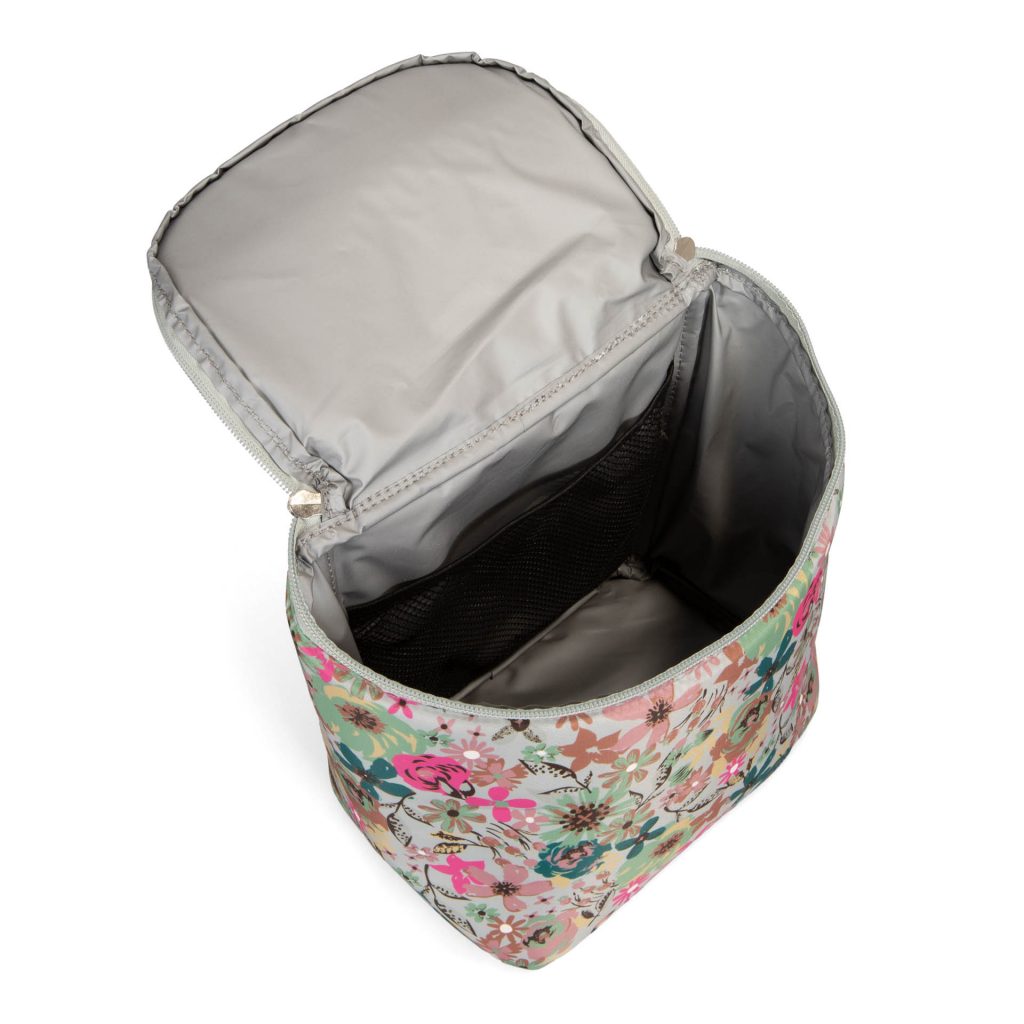 Interior view of a lunch box for kids in elementary school called Ditsy Green designed by Lula showing its beautiful floral print, dark, forest-green accents, and insulated PEVA lining.