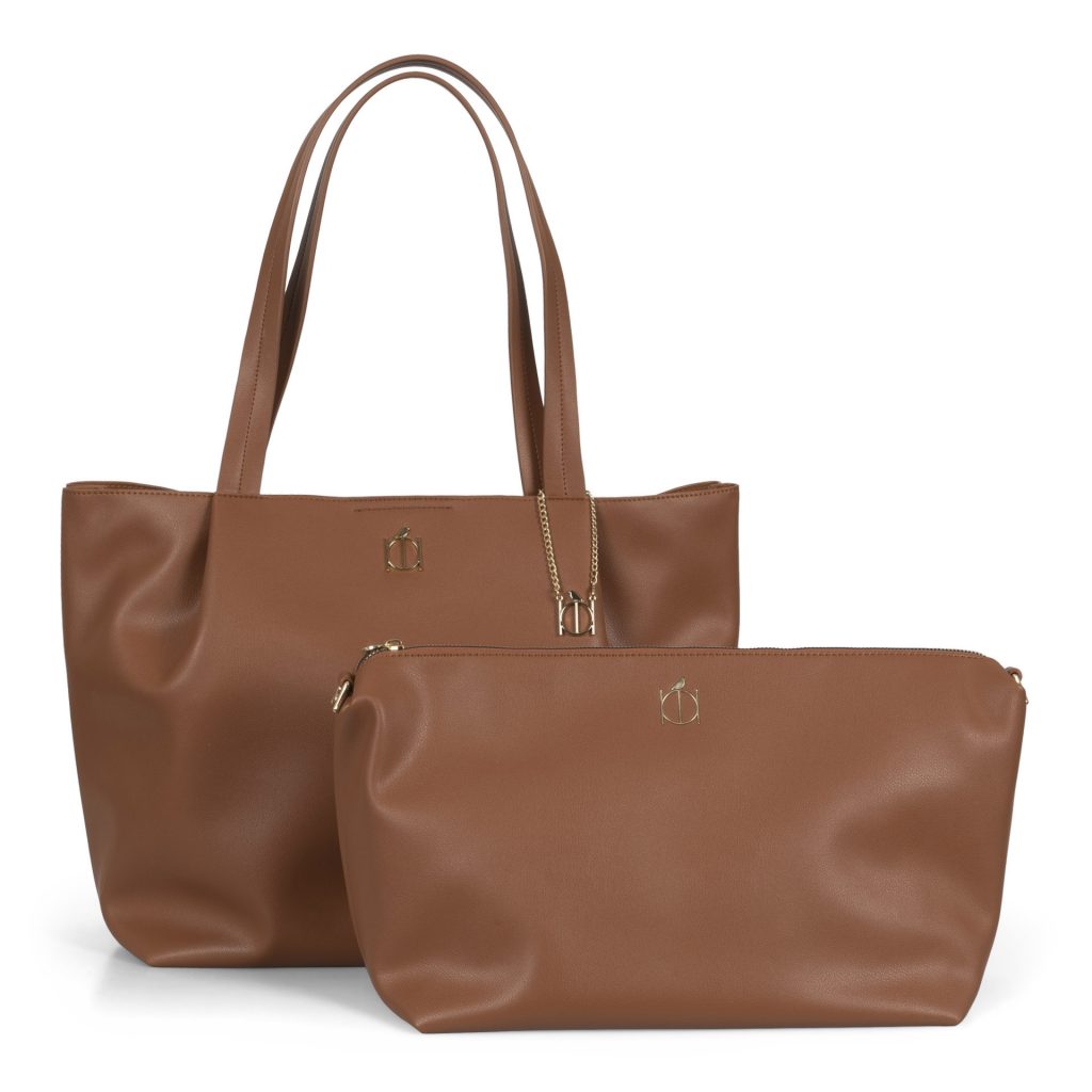 A light brown trending Riona vegan fall handbag and and retrievable interior compartment that transforms into a bag called Casie showing supple faux leather, gold accents, and top handles.